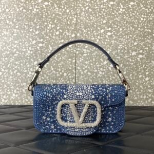 Valentino Garavani  small Locò embellished denim shoulder bag.BW01