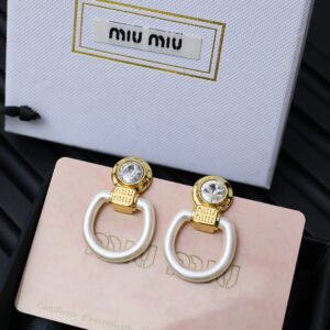M!u M!U Acrylic golden Earrings.JW01