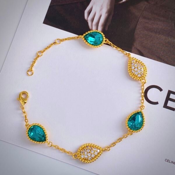 Teardrop shaped diamond and metal bead edge electroplated 18k gold bracelet.JW01