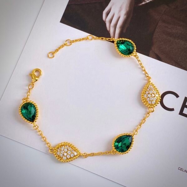 Teardrop shaped diamond and metal bead edge electroplated 18k gold bracelet.JW01 - Image 3
