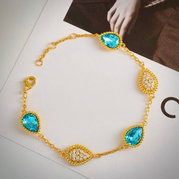 Teardrop shaped diamond and metal bead edge electroplated 18k gold bracelet.JW01 - Image 7