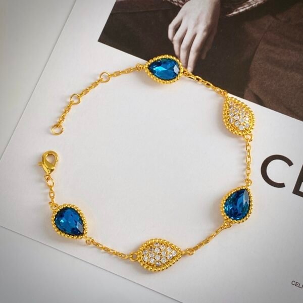 Teardrop shaped diamond and metal bead edge electroplated 18k gold bracelet.JW01 - Image 8