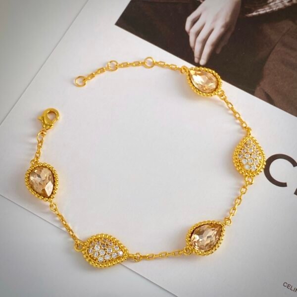 Teardrop shaped diamond and metal bead edge electroplated 18k gold bracelet.JW01 - Image 9