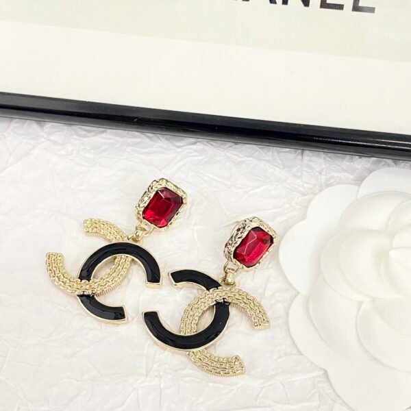 Classic Black and gold color textured Ruby Enamel CC Earrings.JW01