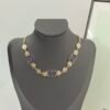 Denim blue CC with pattern of gold coins luxury necklace.JW01
