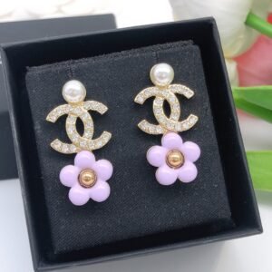Pink flower Earrings with golden CC logo pearl and diamonds.JW01