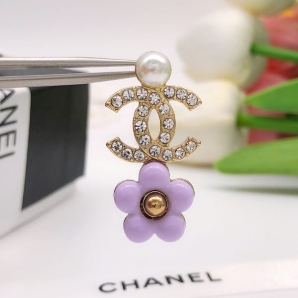 Pink flower Earrings with golden CC logo pearl and diamonds.JW01 - Image 6