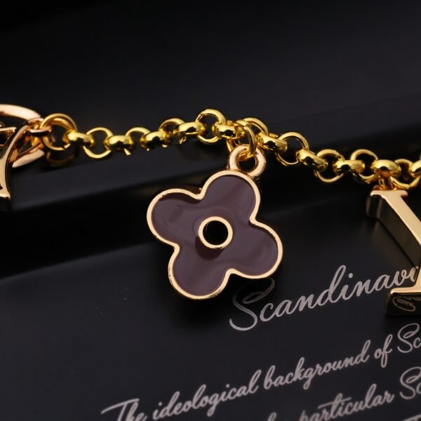 M01413  Monogram gold Metal Bag Charm Chain .JW01 - Image 7
