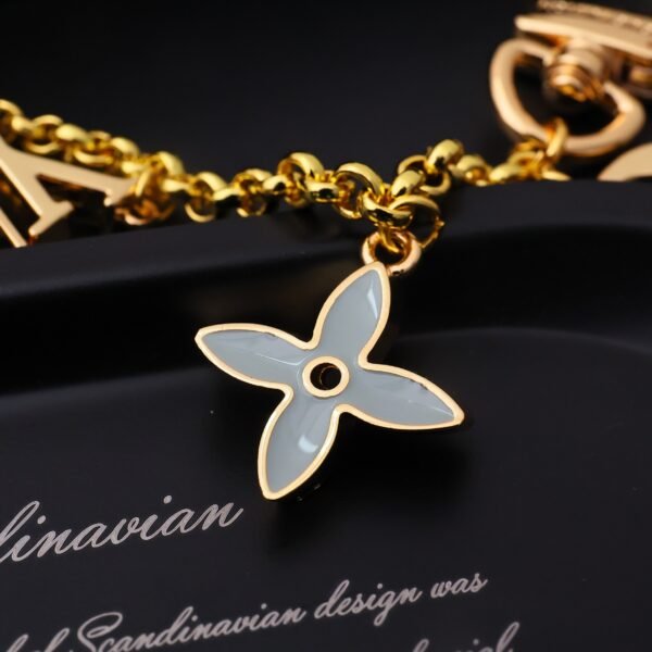 M01413  Monogram gold Metal Bag Charm Chain .JW01 - Image 9