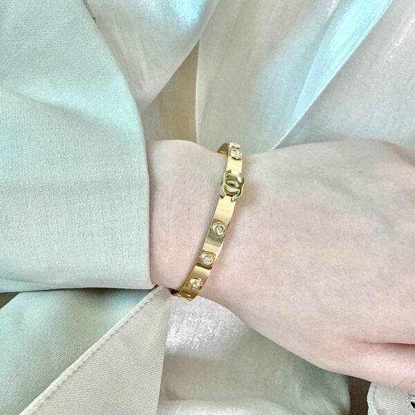 Six Shining Diamond with cc logo stainless steel material gold plated .JW01 - Image 2