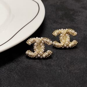 Latest Pearl golden CC earrings .JW01