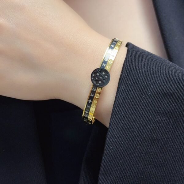 Dual color brand logo engraved Gold / Silver Bracelet .JW01