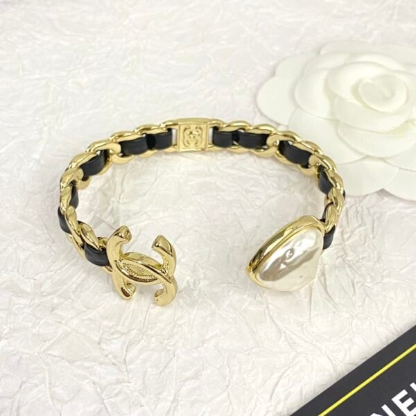 Golden bracelet with Leather CC logo and Heart .JW01 - Image 4