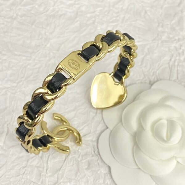 Golden bracelet with Leather CC logo and Heart .JW01 - Image 6