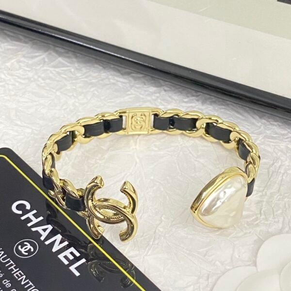 Golden bracelet with Leather CC logo and Heart .JW01 - Image 7