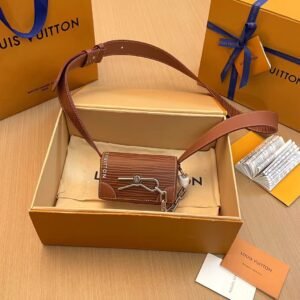 Micro steamer mini Handbag with adjustable leather shoulder straps.