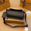Soft Polochon small handbag monogram eclipse coated canvas.BW01