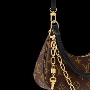 Alternative view of Catchy PM 100% genuine leather with removable gold-toned chain and key-shaped charm armpit bag .