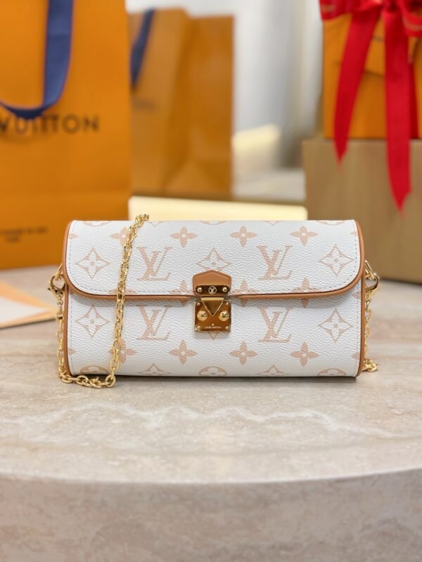 White Flower Series  Pochette Camille in Monogram Dune with Genuine cowhide leather .