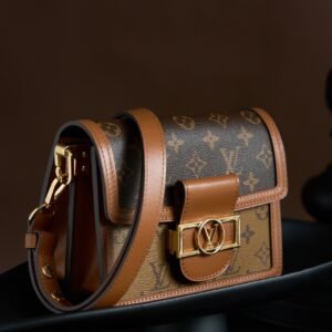 Mini Dauphine Handbag monogram Reverse canvas, trimmed with cowhide-leather.
