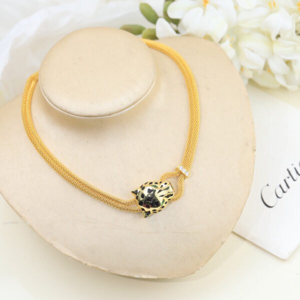 18k gold-plated Luxurious Leopard Head Collar Necklace with emerald leopard eyes.
