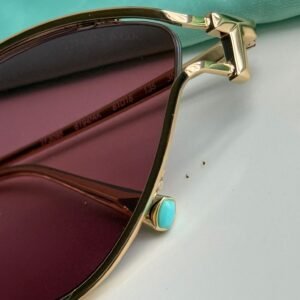 Alternative view of Sunglasses in Pale Gold-colored Metal with Pink cat-eye shaped lenses.