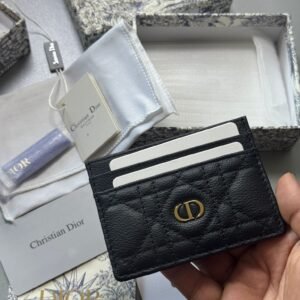 Caro Freesia card holder Crafted in black supple calfskin with Cannage stitching.