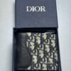 Saddle Bifold Wallet Black Grained Calfskin Oblique Jacquard.