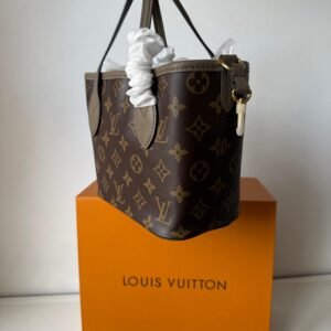 Neverfull Bandoulière Inside Out BB Grained cowhide leather and Monogram canvas.