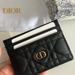 Caro Freesia card holder Crafted in black supple calfskin with Cannage stitching.