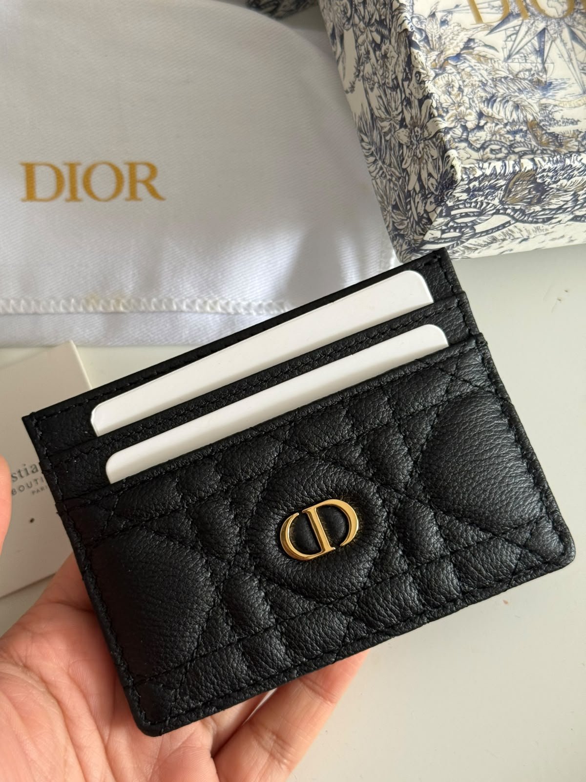 Caro Freesia card holder Crafted in black supple calfskin with Cannage stitching.