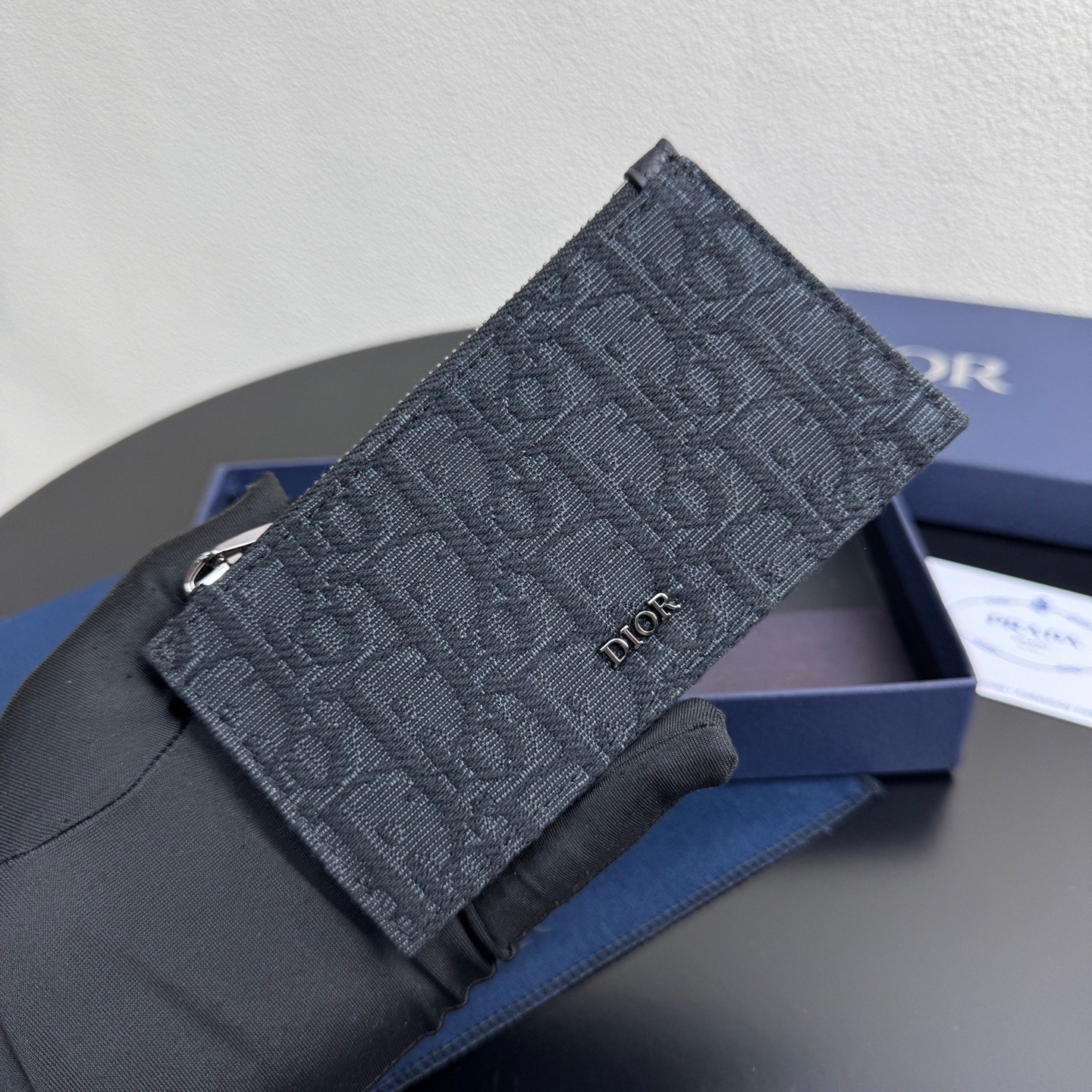 Zipper card holder made of black Oblique printed fabrics and cowhide, 4 card slots.