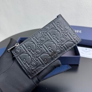 Zipper card holder made of black embossed printing on grained cowhide, 4 card slots.