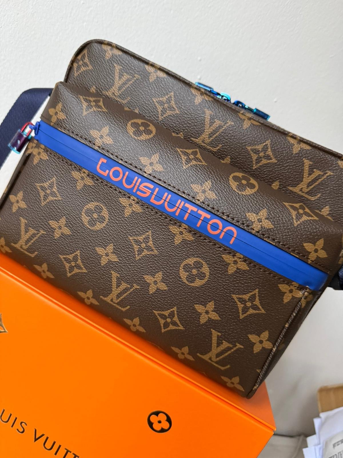 Limited edition Classic brown Monogram canvas compact cross-body bag with blue zip and blue hardware. - Image 11