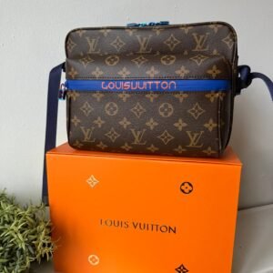 Limited edition Classic brown Monogram canvas compact cross-body bag with blue zip and blue hardware.