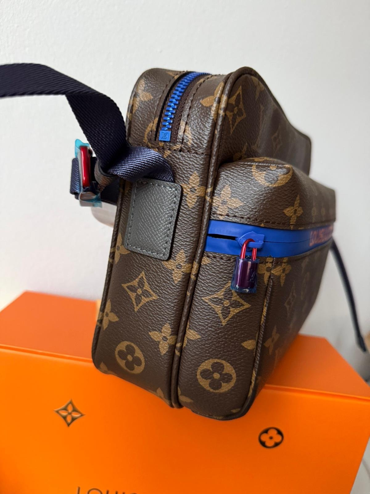 Limited edition Classic brown Monogram canvas compact cross-body bag with blue zip and blue hardware. - Image 3