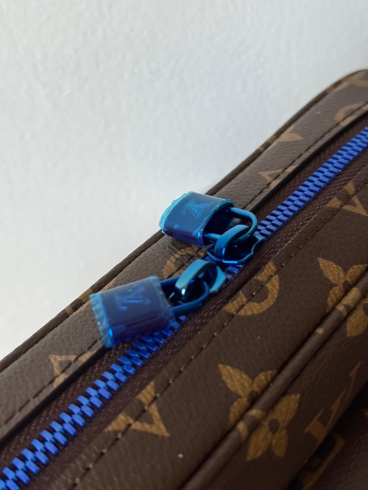 Limited edition Classic brown Monogram canvas compact cross-body bag with blue zip and blue hardware. - Image 12