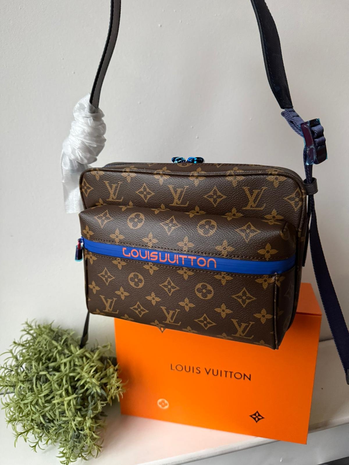 Limited edition Classic brown Monogram canvas compact cross-body bag with blue zip and blue hardware. - Image 6