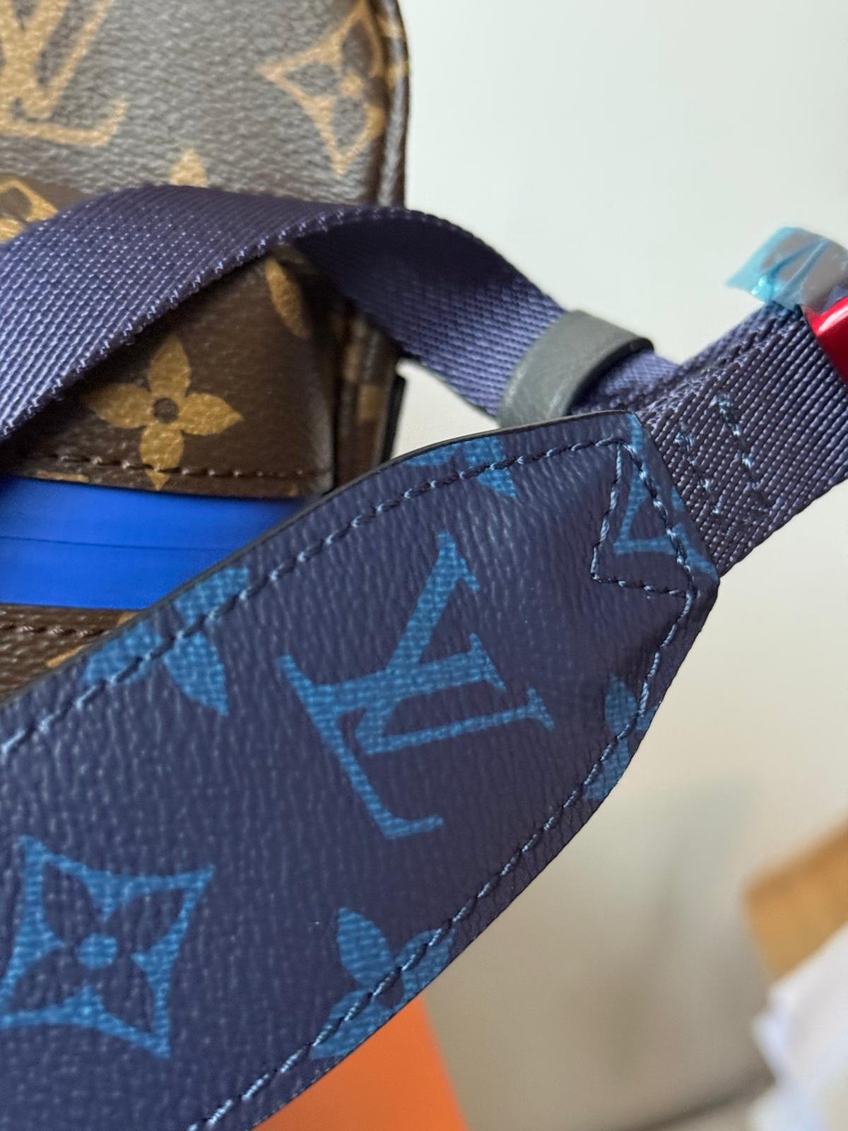 Limited edition Classic brown Monogram canvas compact cross-body bag with blue zip and blue hardware. - Image 7