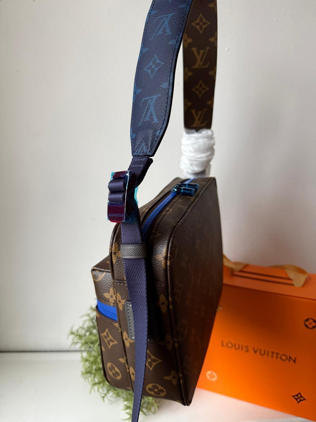 Limited edition Classic brown Monogram canvas compact cross-body bag with blue zip and blue hardware. - Image 8