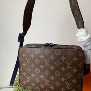 Alternative view of Limited edition Classic brown Monogram canvas compact cross-body bag with blue zip and blue hardware.