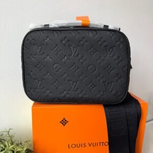 Alternative view of S Lock Messenger crafted in supple black Taurillon leather and embossed with Monogram pattern.