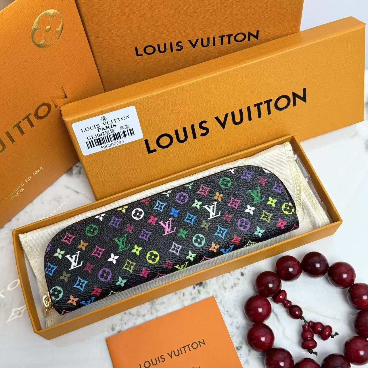 Black/Pink ELIZABETH pencil bag ,Multi-colour Iconic design and elegant appearance made of genuine leather.