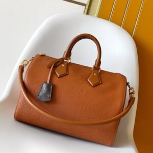 Tan brown Speedy 30 Basic and elegant travel bag made of cowhide leather.