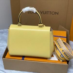 Alternative view of Cluny BB / Cluny Mini Epi leather with smooth resin logo and detachable double sided shoulder strap.