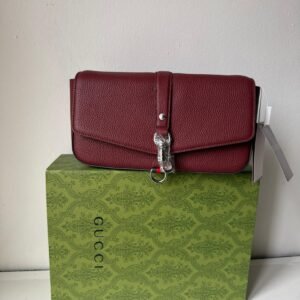 Black / Burgundy cross-body closure bag