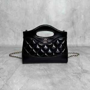 31 Nano Shopping Bag crafted from quilted shiny calfskin leather.