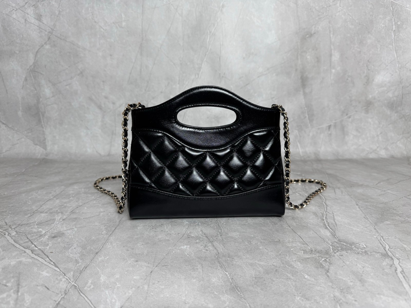 31 Nano Shopping Bag crafted from quilted shiny calfskin leather. - Image 7