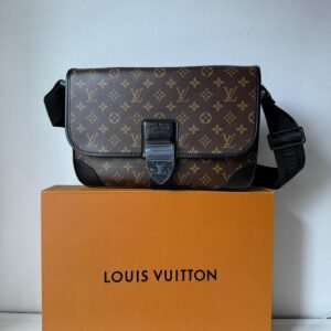 Monogram Arch Messenger MM crossbody strap with black hardware and a magnetic closure.