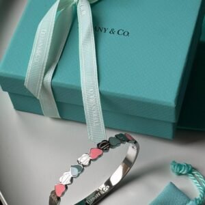 Alternative view of Forever love bracelet with tiffany blue and pink heart in silver bangle.